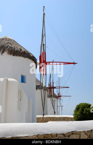 The famous Windmills of the Mykonos. The wind is a blessing on the Mykonos island. The wind is offering a relief from the heat.. Stock Photo