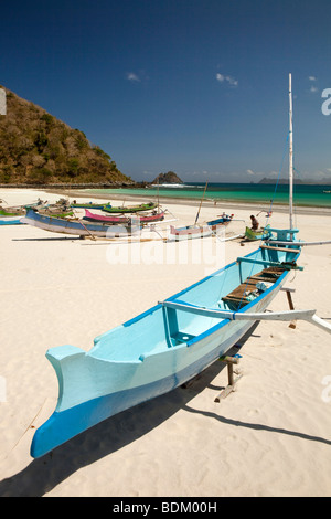 Indonesia, Lombok, South Coast, Selong Blanak, colourfully painted fishing boats on the beach Stock Photo