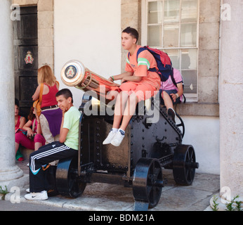 Gibraltar. School children waiting for changing of the Guard at the Guardhouse in front of the Governor's residence. Stock Photo