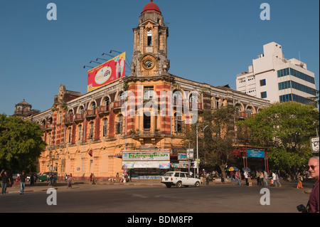 Historic downtown street corner in Yangon, Myanmar (formerly Rangoon, Burma), left over from the British colonial days Stock Photo