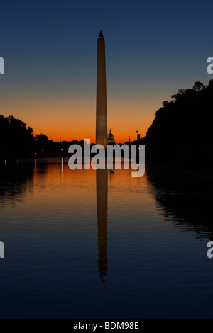 View of Washington Monument, Capitol Building and Reflecting Pool at Sunrise. Stock Photo