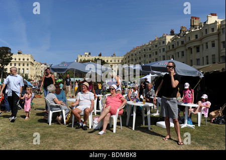 Crowds enjoy good sunny weather at the Brunswick Festival held in Brunswick Square in Hove Brighton UK Stock Photo