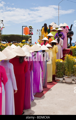 Beautiful Vietnamese woman parade in there traditional dress Stock Photo -  Alamy