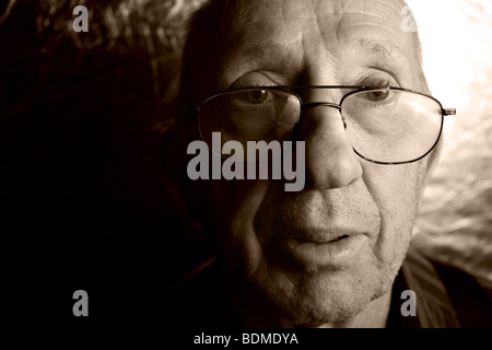 Portrait of elderly man looking at the viewer. Stock Photo