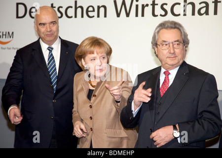 Angela Merkel, German chancellor and CDU Chairwoman, center, Otto Kentzler, president of the Zentralverband des Deutschen Handw Stock Photo