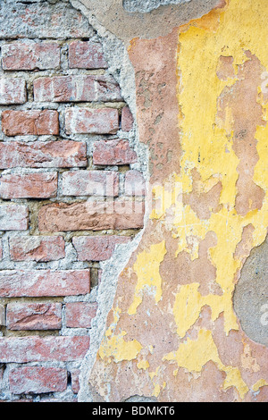 Old messy brick wall texture background exterior Stock Photo - Alamy