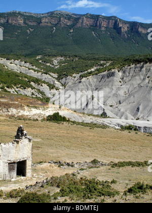 The ruins of the village of Esco in northern Spain, abandoned in 1959 when the valley below it was flooded to create the Embalse Stock Photo