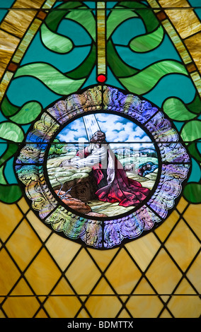 A stained glass window showing Jesus Christ praying before God in Halfway, Oregon. Stock Photo