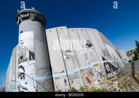 The Israeli separation wall juts into the Palestinian West Bank town of Bethlehem. Stock Photo