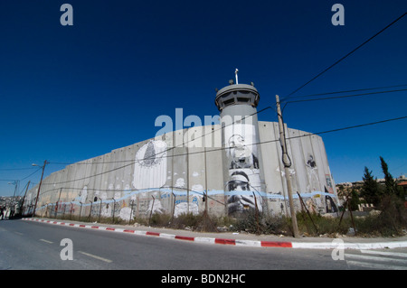 The Israeli separation wall juts into the Palestinian West Bank town of Bethlehem. Stock Photo