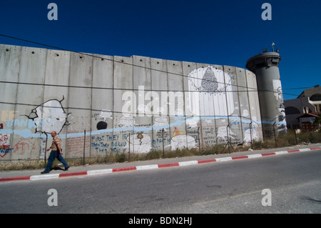 The Israeli separation wall juts into the Palestinian West Bank town of Bethlehem. Stock Photo