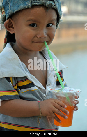 Young Khmer drinking lemonade, Cambodia, Asia Stock Photo