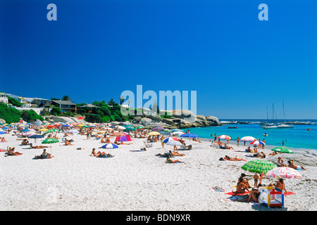Sunbathers at Camps Bay below Table Mountain in Cape Town on Western Cape of South Africa Stock Photo