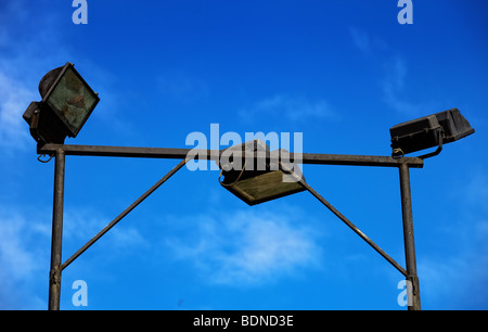 Reflectors on a pole against blue sky Stock Photo