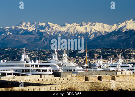 The Vauban harbor and the Mercantour Snowed mountain Antibes Alpes-MAritimes 06 PACA Cote d'azur French Riviera France Europe Stock Photo