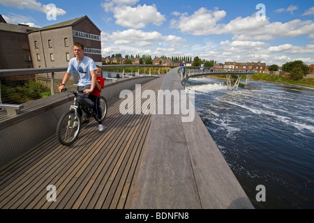 UK Yorkshire Castleford Grand Designs Big Town Plan people on new footbridge over River Aire Stock Photo