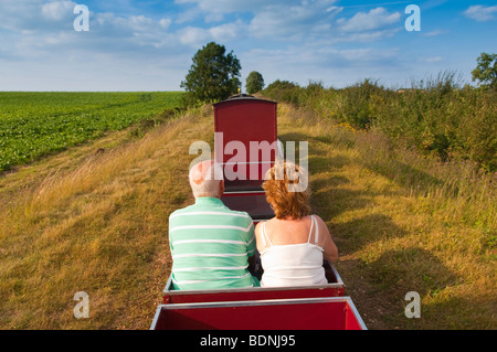 Passengers on The Norfolk Hero steam train at the Wells and Walsingham light Railway in North Norfolk Uk Stock Photo