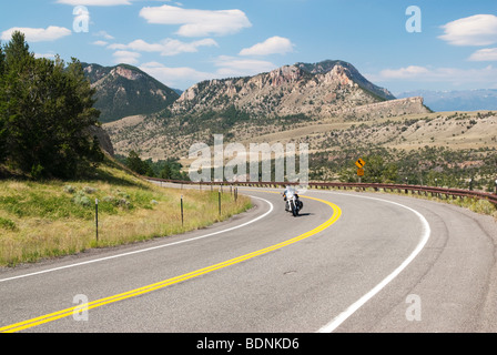 motorcycle rider on the Chief Joseph Scenic Byway in Wyoming