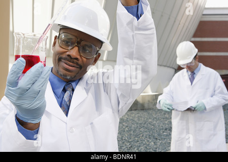 Scientist experimenting with a water sample Stock Photo