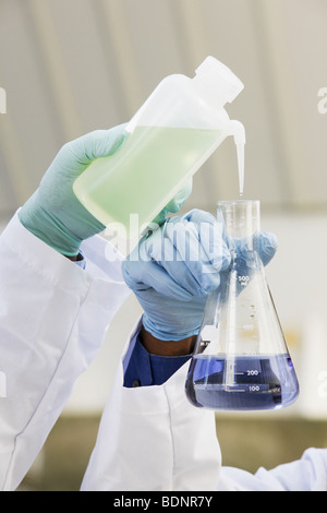 Two scientists experimenting with a water sample Stock Photo