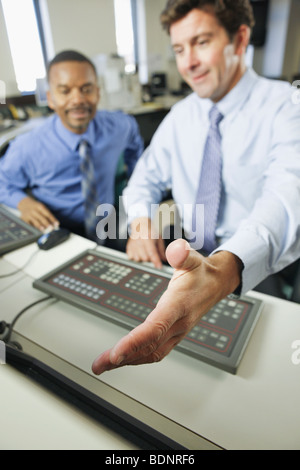 Two operating engineers in a control room Stock Photo