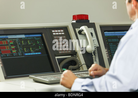 Operating engineer working in a control room Stock Photo