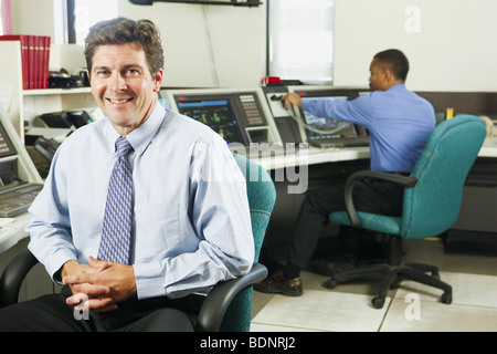 Two operating engineers in a control room Stock Photo