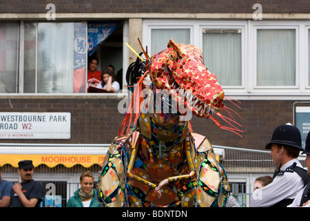 Dinosaur costume above the law at the Notting Hill Carnival 2009 Stock Photo