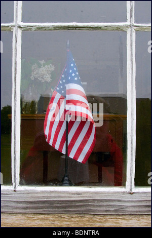 The American flag seen through a window Stock Photo