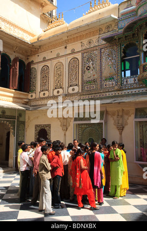 An Indian school party visiting the City Palace in Udaipur, India Stock Photo