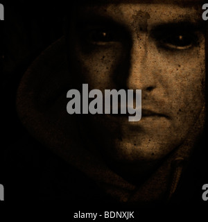 Close up of a mans face looking at the camera Stock Photo