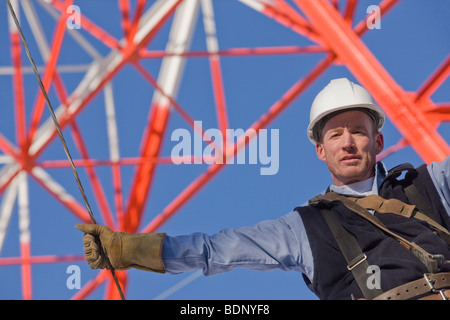 Low angle view of a cable lineman Stock Photo