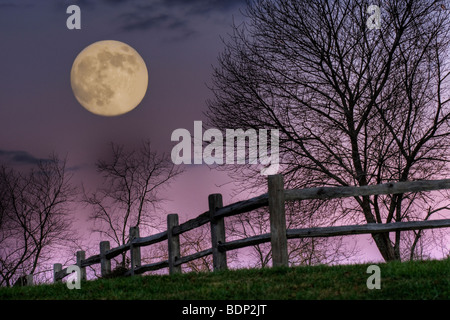 November Moon rising over hill at Inn at Cedar Falls in Hocking Hills Stock Photo