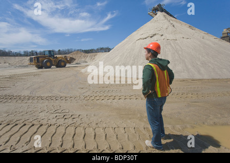 Engineer standing at a plant Stock Photo