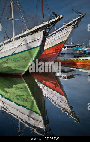 Indonesia, Sulawesi, Makassar, (formerly Ujung Pandang) Pelabuhan Paotere harbor where Bugis sailing ships berth, late afternoon Stock Photo