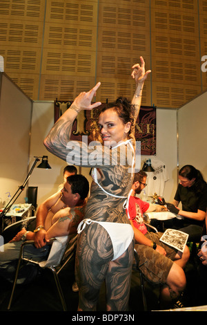 A woman displays her full body tattoos, Tattoo Convention, Capetown, South Africa Stock Photo
