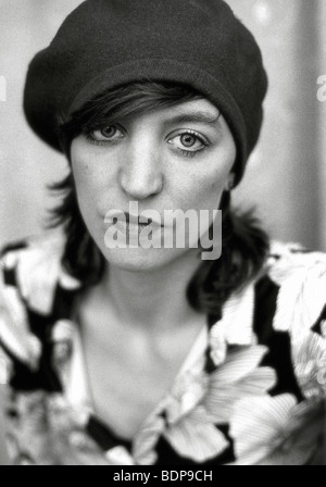 a middle aged woman wearing a hat lookig directly at the camera Stock Photo