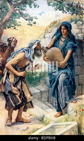Painting of Rebekah in which she is offering water to Abraham's servant Eliezer painted by Harold Copping Stock Photo
