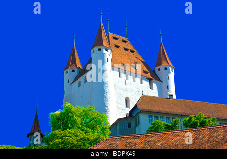 Picture, cartoon-like city of Thun - Switzerland. The towers of the ancient castle of Thun. Stock Photo