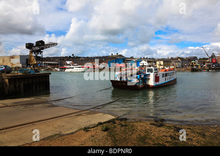 The Chain ferry that connects East and West Cowes arrives at East Cowes, Isle of Wight, UK Stock Photo