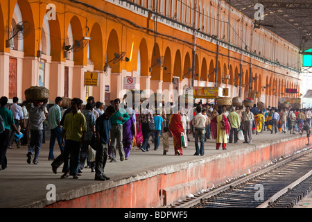 Passengers Wait on the Platform at Sealdah Railway Station in Calcutta India Stock Photo