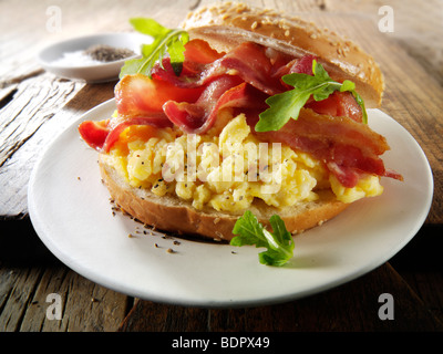 Crispy backon and scrambled eggs on a bagel Stock Photo