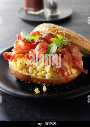 Crispy backon and scrambled eggs on a bagel Stock Photo