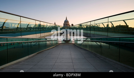 Symmetric view of the Millennium Bridge with St Paul's Cathedral in the background in London Stock Photo