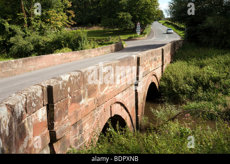 UK, England, Cheshire, Aldford, car crossing bridge over River Dee at ford on Watling Street, Roman Road Stock Photo