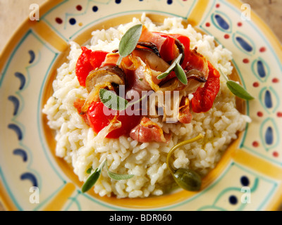 Classic risotto with Roast peppers, vegetables and bacon Stock Photo