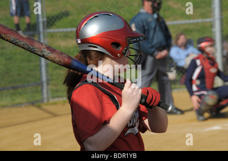 batter in girl's high school softball game Stock Photo