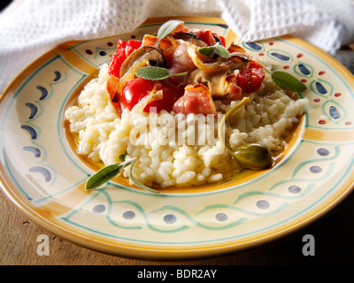 Classic risotto with Roast peppers, vegetables and bacon Stock Photo