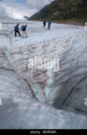 Hikers on the Root Glacier in Wrangell-St. Elias National Park Stock Photo