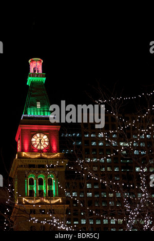 Daniels & Fisher Clock Tower illuminated for the Christmas season. Located in Denver, Colorado on the 16th Street Mall. Stock Photo